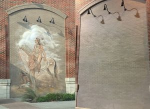 kansas city legends brick wall before photo with native american painting and after photo of painting removed