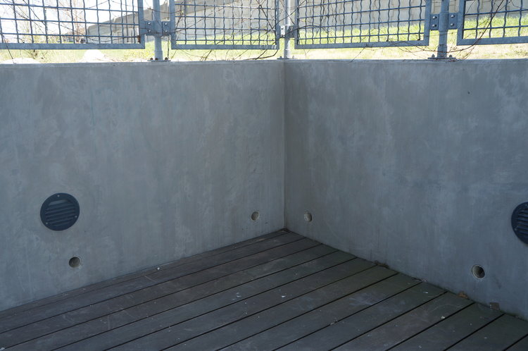 concrete retaining wall after graffiti removal