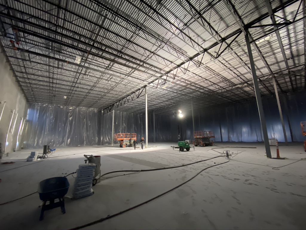 interior of containment section of warehouse with baking soda on the ground