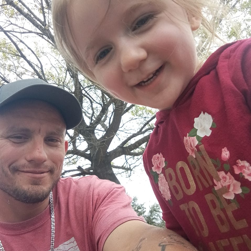 zack with daughter outside