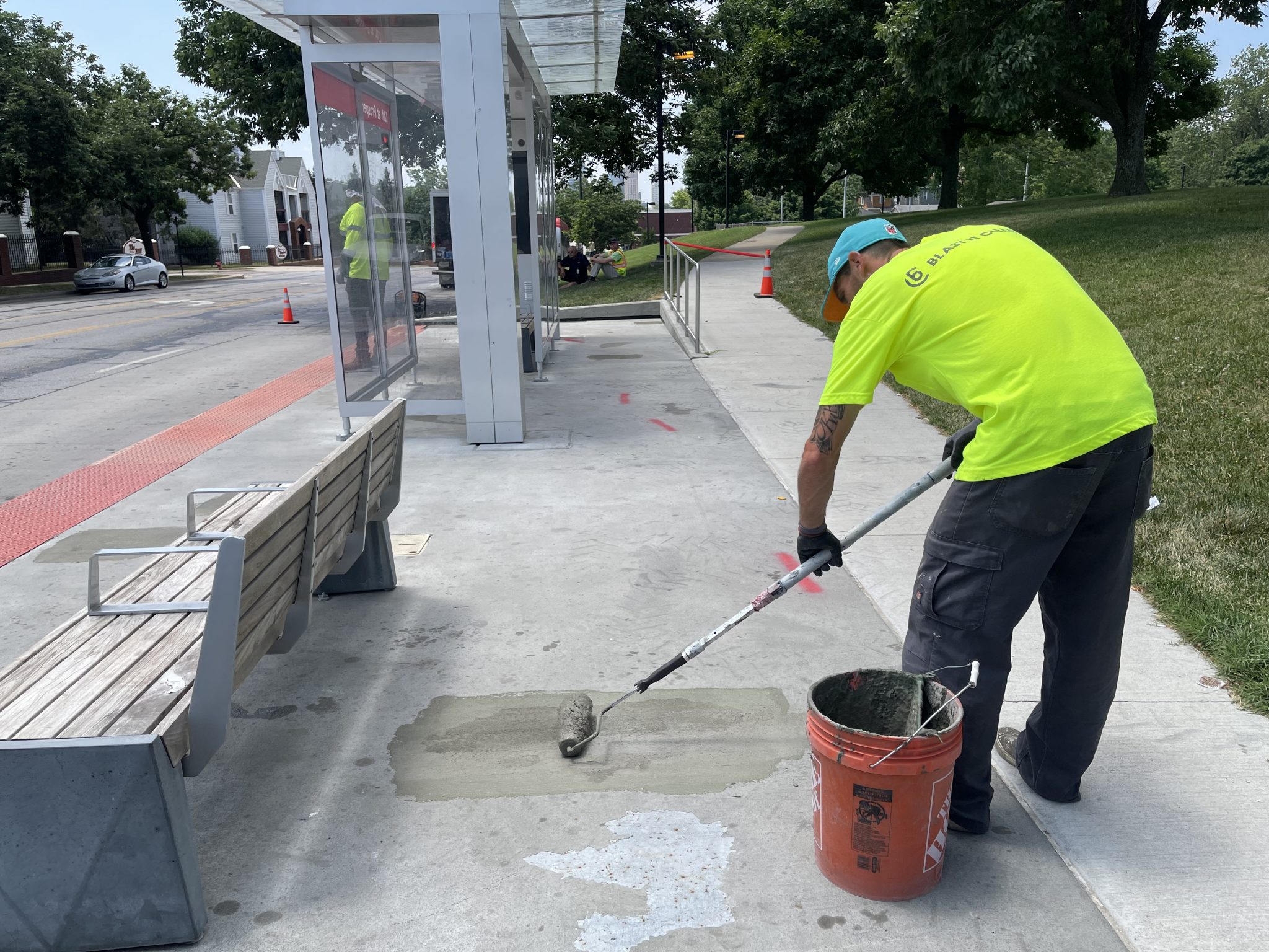 nationwide painting services crew member applying traffic coating