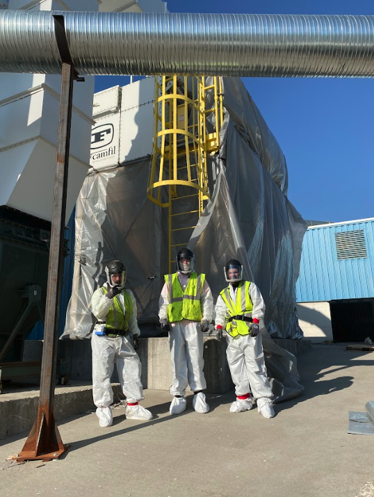 crew members on job site in PPE