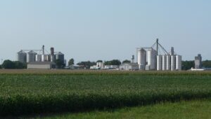 field of crops and silos in nebraska