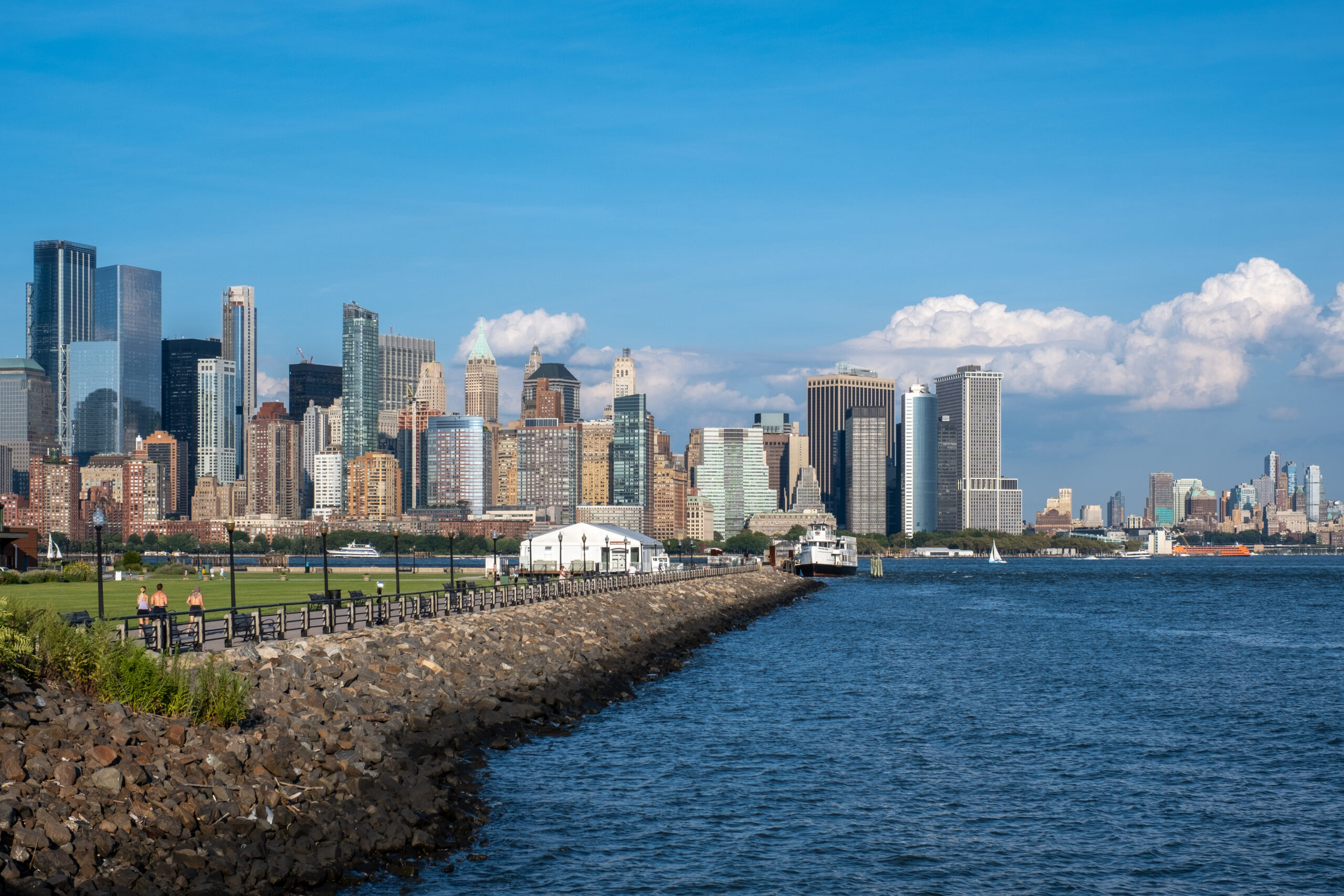 coastline with skyline of jersey city, new jersey in background