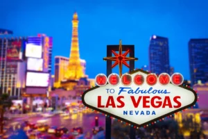 las vegas sign with the strip in background in nevada