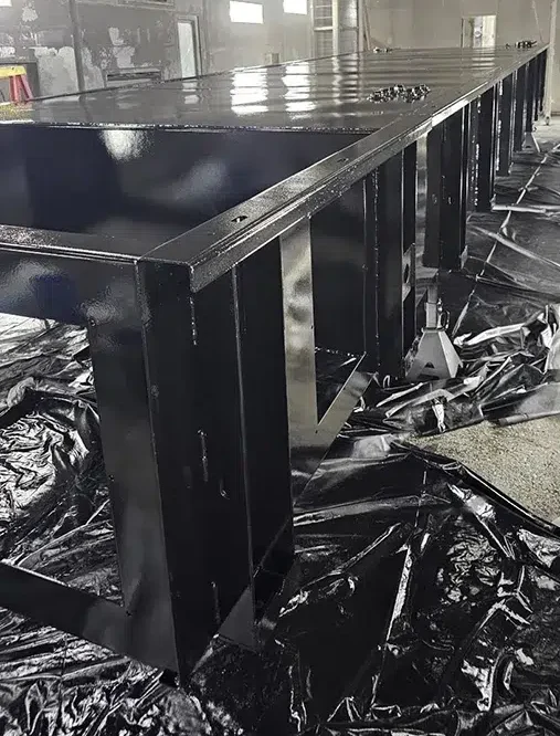 large steel structure after final black coating of paint large steel structure after final black coating of paint
