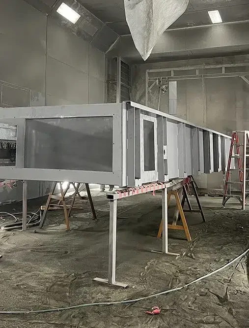 large steel structure after sandblasting in the paint booth large steel structure after sandblasting in the paint booth