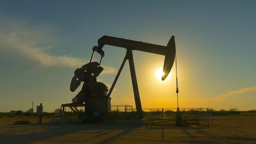texas oil rig with sunset in background texas oil rig with sunset in background