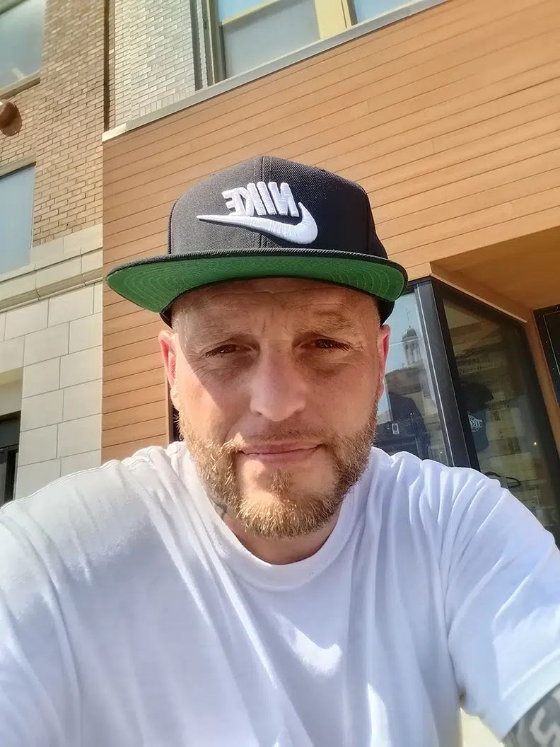 headshotofmitchellinhat headshotofmitchellinhat