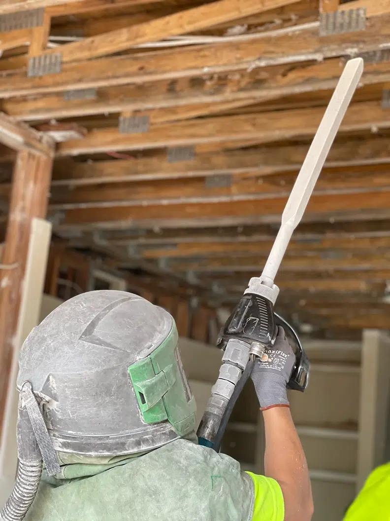 close up of team member dry ice blasting