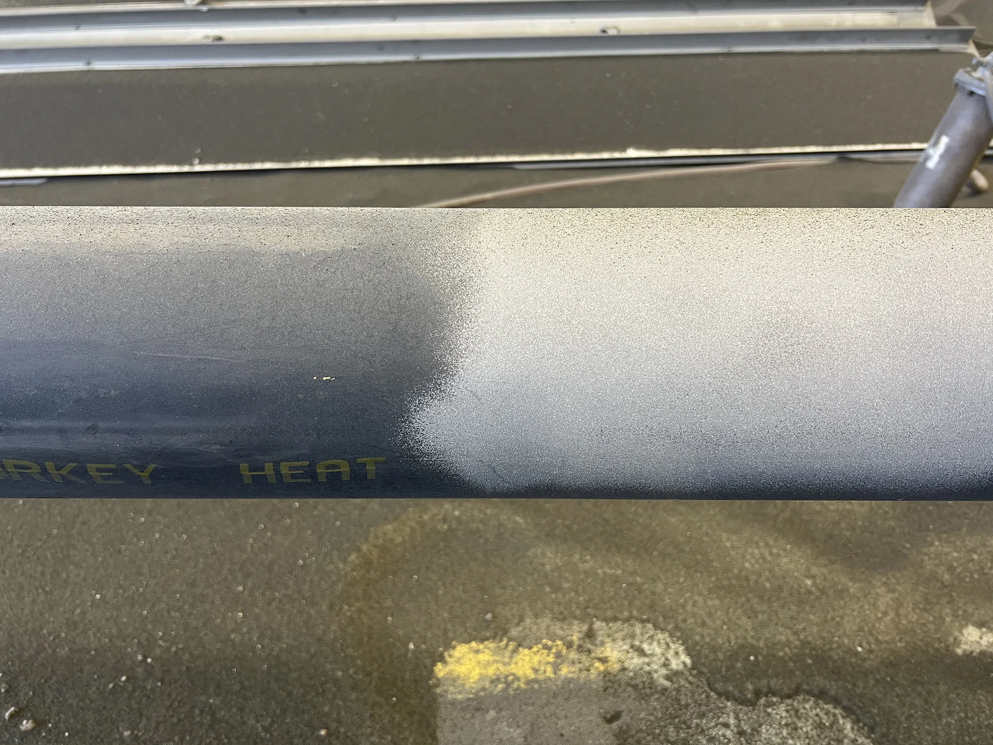 During coating removal of steel pipe