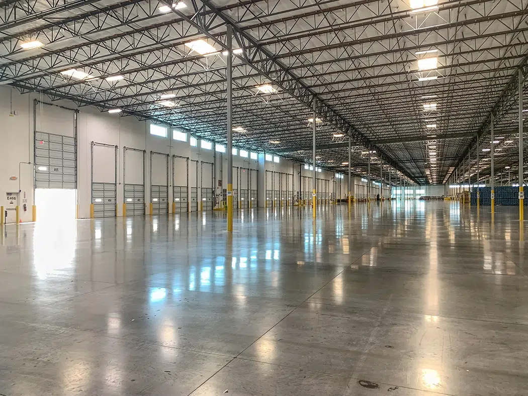 brightly lit empty warehouse