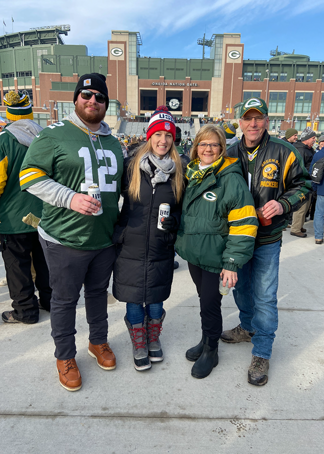 alex and family in front of packers stadium