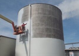 ethanol tank being painted white